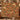 Couple holding a personalized Terracotta Acanthus Hearth Morris Style woven blanket with custom family name