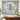 Hollyhock Porcelain Breeze Garden woven blanket displayed as a wall tapestry
