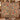 Couple holding a personalized Palampore Tree of Plenty woven blanket with custom family name