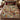 Estate Paisley Tartan Library woven blanket spread across a bed in a cozy bedroom
