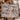 Couple holding a personalized Vermont Maple Sugaring woven blanket with custom family name