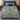 Almond Blossom Eight Nights Hanukkah woven blanket with custom family name spread on a bed