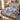 Alpine Ibex Christmas quilt bedding set with 2 matching pillowcases on a bed with holiday decor