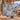 Couple holding a personalized Alpine Ibex Christmas woven blanket with custom family name