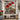 Amaryllis Christmas Windowsill woven blanket displayed as a wall tapestry above a wooden bench