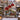Amaryllis Christmas Windowsill woven blanket held outdoors on a snowy Dutch canal street