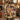 Holding a personalized autumn leaf photo blanket with custom family name