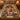 Autumn leaf photo blanket spread on a bed