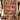 Barn Red Tree Farm Landscape woven blanket displayed as a wall tapestry above a bench