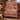 Barn Red Tree Farm Landscape woven blanket draped over a red wingback armchair