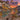 Couple holding a personalized Bat Flight River Bluff woven blanket with custom names at sunset