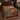 Bat Flight River Bluff woven blanket spread on a bed with bats over a river at dusk