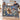 Couple holding a personalized Bethlehem Lily Nativity woven blanket with custom family name