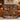 Personalized Christmas Reading House woven blanket draped over a cognac leather sofa