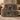 Personalized Midnight Conservatory Library woven blanket draped over a taupe sofa