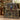 Personalized Midnight Conservatory Library woven blanket draped over a green velvet sofa