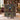 Personalized Midnight Conservatory Library woven blanket held up by a couple indoors