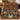 Personalized Twelve Days of Christmas pear tree woven blanket draped over a green velvet sofa