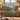 Black Bear Huckleberry Heritage woven blanket draped over a sofa in a living room