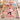 Personalized Eiffel Tower macaron girl photo blanket with name HARPER laid on a pink kids bed