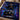 Personalized Batman boy neon night Jackson Storm race car photo blanket laid on a kids bed with name JAYDEN