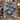 Holding a personalized Blue Ivory Christmas Swan woven blanket with custom names woven in