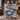 Couple holding a personalized Blue Ivory Christmas Swan woven blanket with custom names woven in