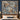 Blue Squirrel Hazelnut Pattern woven blanket design shown without a name as a wall tapestry above a bed