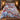 Blue Willow Pheasant Christmas comforter set with 2 matching pillowcases on a bed in a warm holiday bedroom