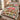 Personalized Brown campus quilt bedding set with custom name in a bedroom