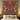 Burgundy Cardinal Bell Garden woven blanket displayed as a wall tapestry above a bed