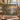Canvasback Duck Marsh Dawn woven blanket displayed in a cozy room