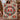 Couple holding a personalized cardinal wreath woven blanket with custom names woven in