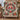 Cardinal wreath woven blanket draped over an armchair
