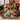 Personalized Christmas Baking Portrait photo blanket with family photos draped over a sofa