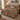 Christmas Cardinal Ribbon quilt bedding set with 2 matching pillowcases on a bed with Christmas decor