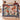 Couple holding a personalized Christmas Carousel Garden woven blanket with custom family name