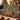 Christmas Cats woven blanket draped over a sofa in a holiday living room