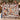 Couple holding a personalized Christmas Dogs Poinsettia woven blanket with custom family name