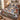 Christmas Eve Reindeer Forest quilt bedding set with 2 matching pillowcases on a bed with Christmas decor