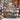 Christmas Eve Reindeer Forest woven blanket draped over a wooden rail outdoors in the snow
