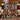 Christmas Eve Village photo blanket with family photos and custom name draped over a sofa