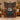 Christmas Matinee woven blanket held up in a festive living room