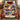 Poinsettia Christmas photo collage blanket spread on a bed