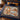 Christmas Music Arcade Christmas woven blanket spread across a bed
