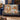 Christmas Music Arcade Christmas woven blanket draped over a sofa