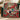 Christmas musical woven blanket draped over a sofa