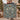 Couple holding a personalized Christmas Rose Medallion woven blanket with custom family name woven in