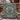 Christmas Rose Medallion woven blanket displayed outdoors on a snowy porch