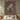 Christmas rose woven blanket displayed as a Christmas wall tapestry above a bed